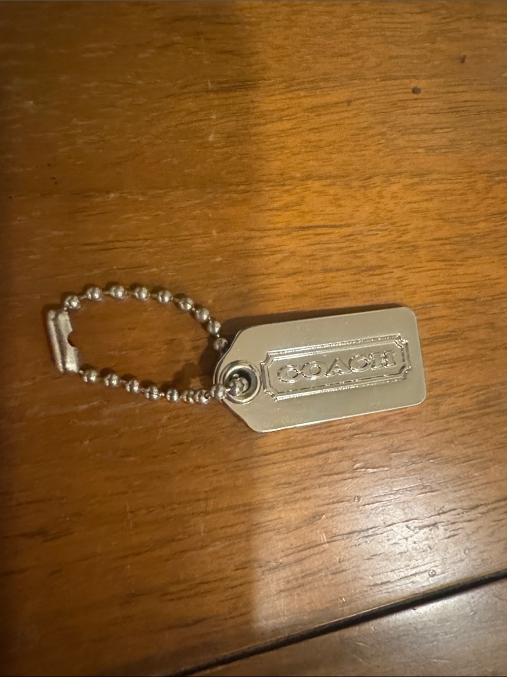 Coach Silver Metal Dog Tag Keychain